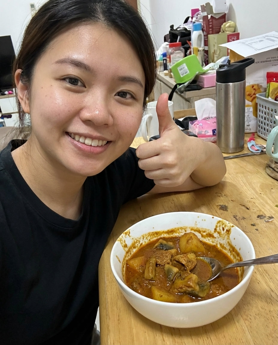 Young woman thumbs up